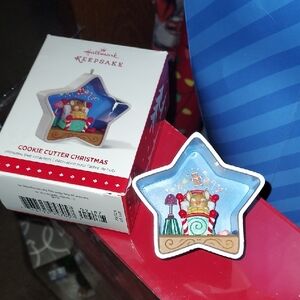 3 Hallmark Keepsake Star Ornaments with Blue and Red Accents..